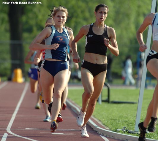 Joan Bohlke of Reebok Boston runs in second place.