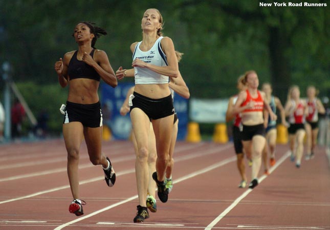 Catherine Regan (almost completely obscured) finished third in 2:12.89.