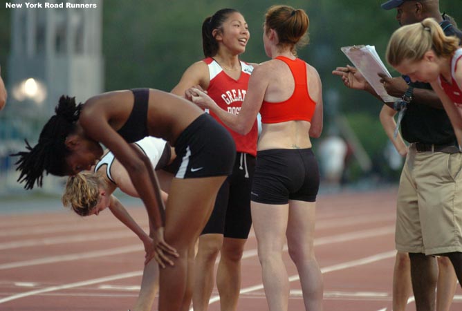 Jen Lee (smiling and being congratulated by a teammate) finished sixth in a PR 2:15.93.