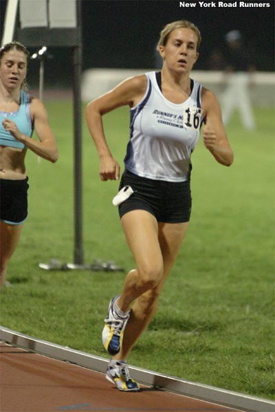 Julie Culley, of the Mizuno Runner's High team, runs in third place.