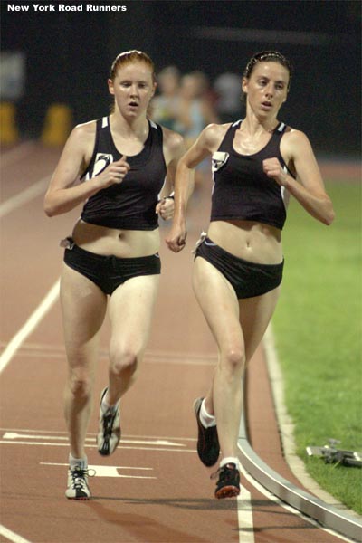 Erin Dromgoole (right) runs with Reebok Boston teammate Emily Logan.