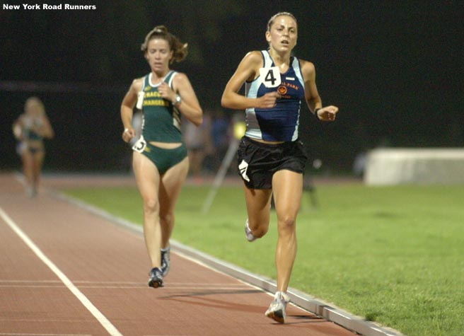 Lauren Esposito (with a lap to go) finished fifth in 18:16.38.