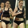 Reebok Boston's Emily Logan leads teammate Erin Dromgoole.