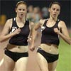 Erin Dromgoole (right) runs with Reebok Boston teammate Emily Logan.