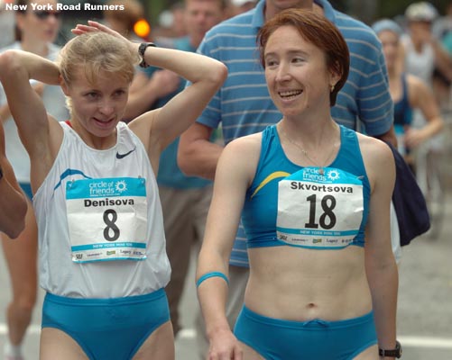 Lyubov Denisova and Silvia Skvortsova share a laugh with...