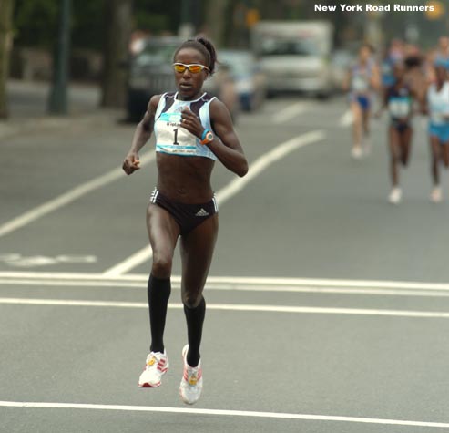 As she headed up Central Park West, Kiplagat increased her lead, hitting the first mile mark in 4:48.