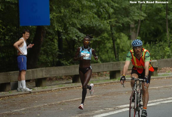 Kiplagat passes the three-mile mark.