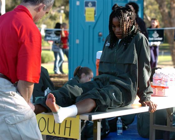 South Regional winner Nichole Jones gets her ankle taped before the race.