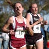 Liz Costello (left, 21st, 18:09) and Crystal Reed (24th, 18:14) with less than two tenths of a mile to go.