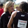 Suzy Favor Hamilton talks to one of the male athletes after the race.