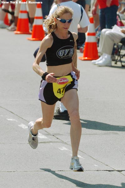 A member of the Genesee Valley Harriers warms up for the race.