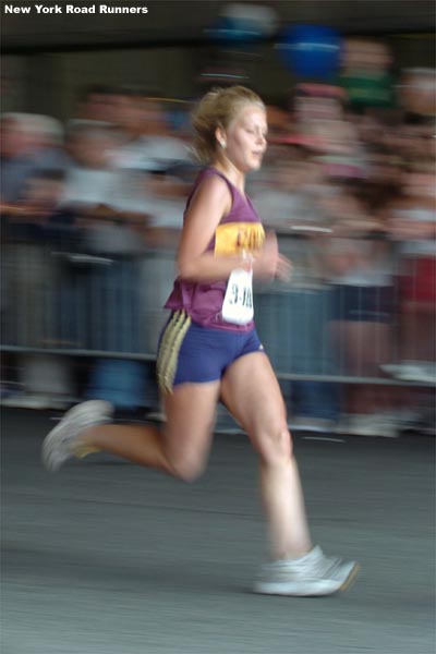 A runner speeds to the finish.