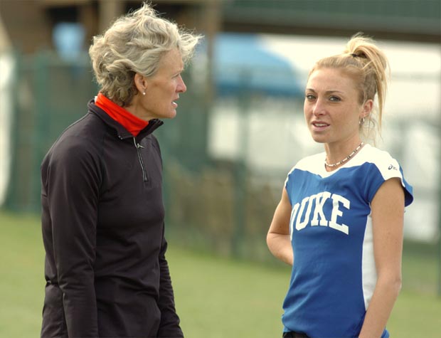 Cheryl Treworgy (left), whose daughter Shalane Flanagan (not pictured) won two NCAA XC titles, chats with Duke's Clara Horowitz.