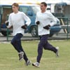 Kurt Benninger of Notre Dame (left) and a teammate.