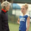 Cheryl Treworgy (left), whose daughter Shalane Flanagan (not pictured) won two NCAA XC titles, chats with Duke's Clara Horowitz.