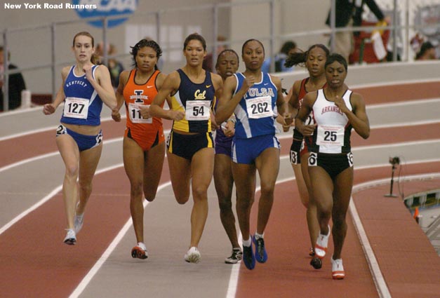 Arkansas' Denton continues to lead and Tulsa's Melanie Hardy runs on her shoulder in the outside of lane one.