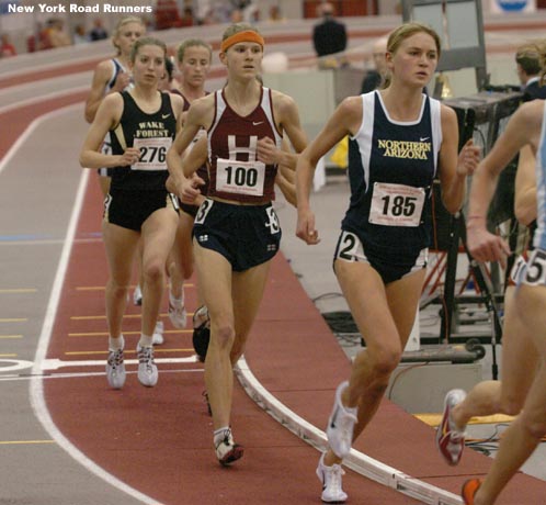 Lindsey Scherf runs in fifth place and Annie Bersagel in sixth.