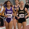 Kansas State's Lysaira Roman-Del Valle and Missouri's Ashley Patten.