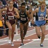 L-R, at the start of the first mile prelim: Lambie, Mary Kamau, and Erin Donohue.