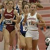 Anne Shadle takes over the lead, with Duke's Shannon Rowbury in second and Stanford's Arianna Lambie in third.