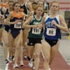 UNC-Charlotte's Cassie Ficken (#181) runs in second place and Adriana Pirtea (#259) runs in about fourth.