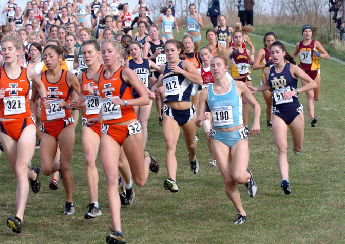 #321 Katie Coppin, #323 Rachel Hernandez, #320 Maggie Carroll, #322 Katie Engel, #412 Shannon Oster, #190 Tenke Zoltani, and #515 Elizabeth Webster (Notre Dame jersey).