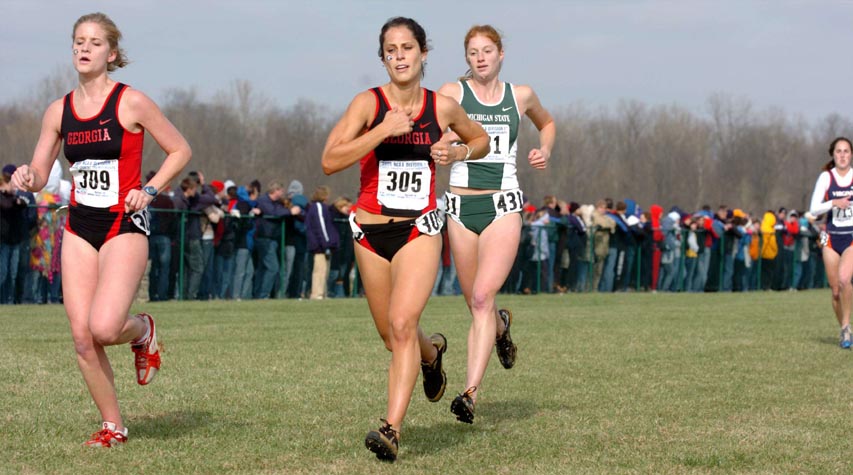 Georgia teammates Rebekah Madebach (left) and Nicole DeMarco lead Michigan State's Emily Adama.