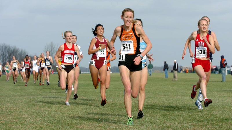 Oklahoma State's Mary Davies (31st, 20:29.2) and Indiana's Jessica Gall (32nd, 20:29.3).