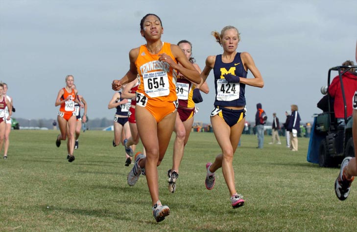 Tennessee's Felicia Guliford (left, 58th, 20:45.9) and Michigan's Alyson Kohlmeier (59th, 20:46.5).