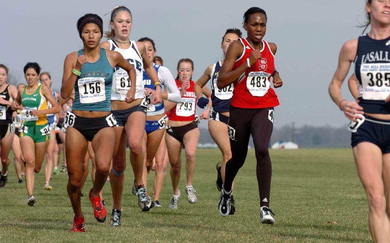 Coastal Carolina's Annemarie Moutsinga (#156, 105th, 21:12.0), and NC State's Angelina Blackmon (#483, 106th, 21:12.4).