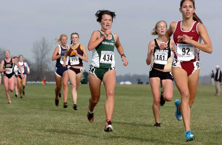 Hamilton, a freshman at Michigan State runs alongside Colorado's Kristin Hoogheem, a junior.