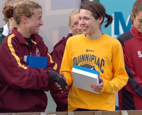 Hastings shakes hands with Quinnipiac's Katie Gwyther (12th).