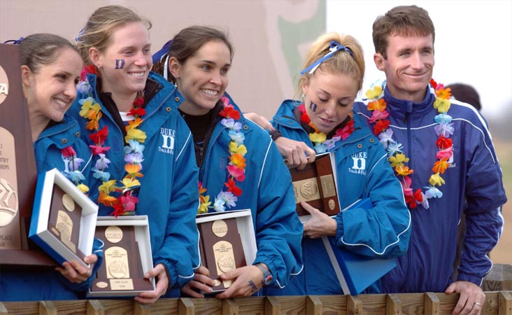 Duke is coached by Kevin Jermyn (right). Even though third place wasn't what they were shooting for, the team was all smiles at the awards ceremony.