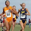 Tennessee's Felicia Guliford (left, 58th, 20:45.9) and Michigan's Alyson Kohlmeier (59th, 20:46.5).