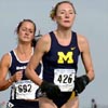 Michigan's Jessie Stewart (97th, 21:09.0) leads Utah State's Tiffany Strickland (98th, 21:09.1).