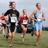 Wake Forest's Erin Franklin (131st, 21:22.6), NC State's Brittany Tinsley (133rd, 21:23.4), and UNC's Cassie King.