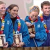 Duke is coached by Kevin Jermyn (right). Even though third place wasn't what they were shooting for, the team was all smiles at the awards ceremony.