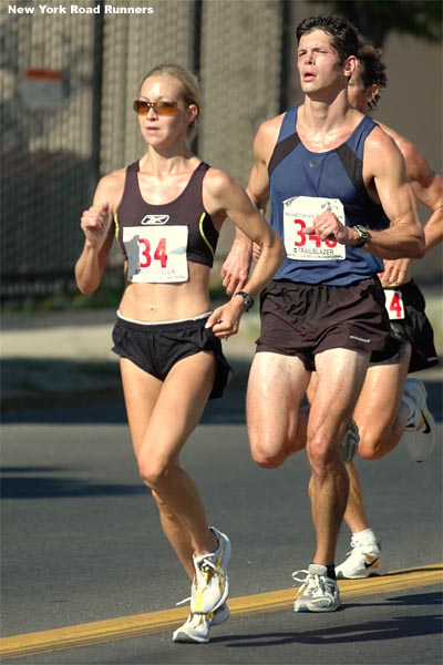 Shortly after the eight mile mark, Blake Russell held a comfortable lead in the women's race. This section of the course was into a head wind...