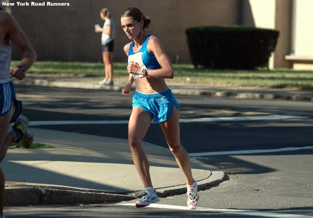 Nicole Aish ran in third place just after the eight mile mark.