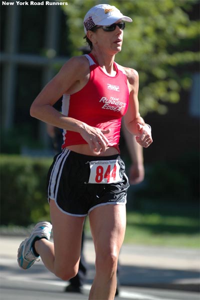 Jean Bohan, 36, of the Runner's Edge Racing Team finished 38th in 1:23:28.