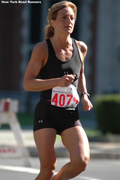 Margaret Coffey, 46, finished secondin the 45-49 age group and 48th among all the women in 1:27:09 (1:26:52 chip time).