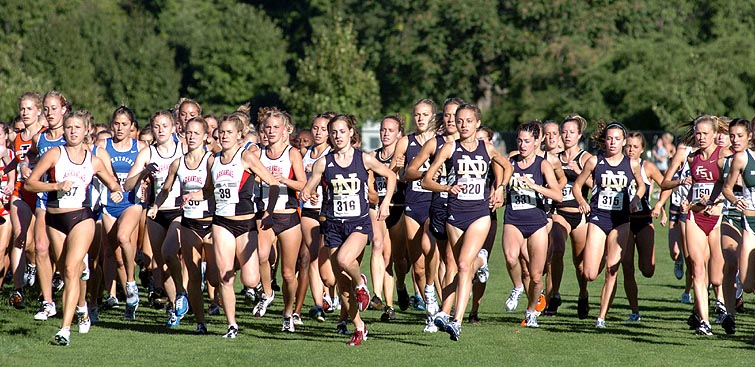 #316 Molly Huddle and #320 Stephanie Madia moved to the front early.