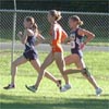 L-R: Molly Huddle, Cassie Hunt, and Stephanie Madia lead the way, Alyson Kohlmeier runs in fourth and Ramsey Kavan in fifth.