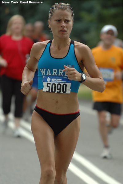 Eventual third-place finisher Victoriya Ganushina of Warren Street warms up for the NYRR Team Championships.