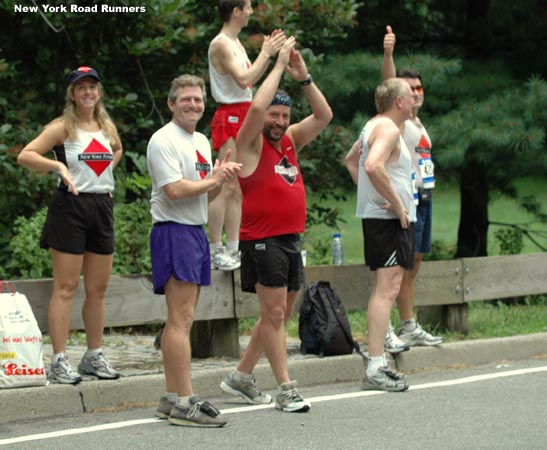 Team members who weren't competing - or who had already competed in the men's race - cheered from the sidelines.