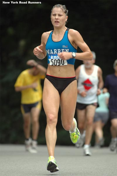 ...finished third in 29:18, helping her team to edge out the Central Park Track Club by one point.