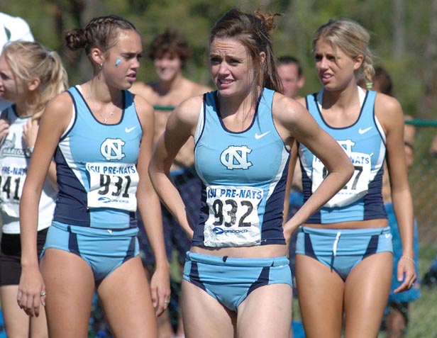 UNC's Megan Kaltenbach (with teammate and sister Katelyn Kaltenbach on the left and another teammate, Brianna Felnagle on the right.