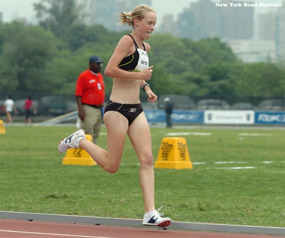 Kim Smith of New Zealand, who finished out her collegiate career at Providence College in November, runs in sixth place.