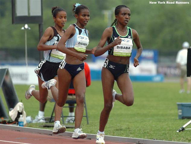 Though the weather had cooled off a bit by the time of the women's 5,000...