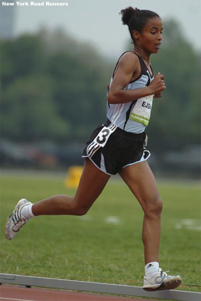 Sentayehu Ejigu runs in third place with two laps to go.